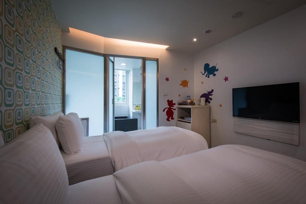 J-Hotel Цзяосі Екстер'єр фото