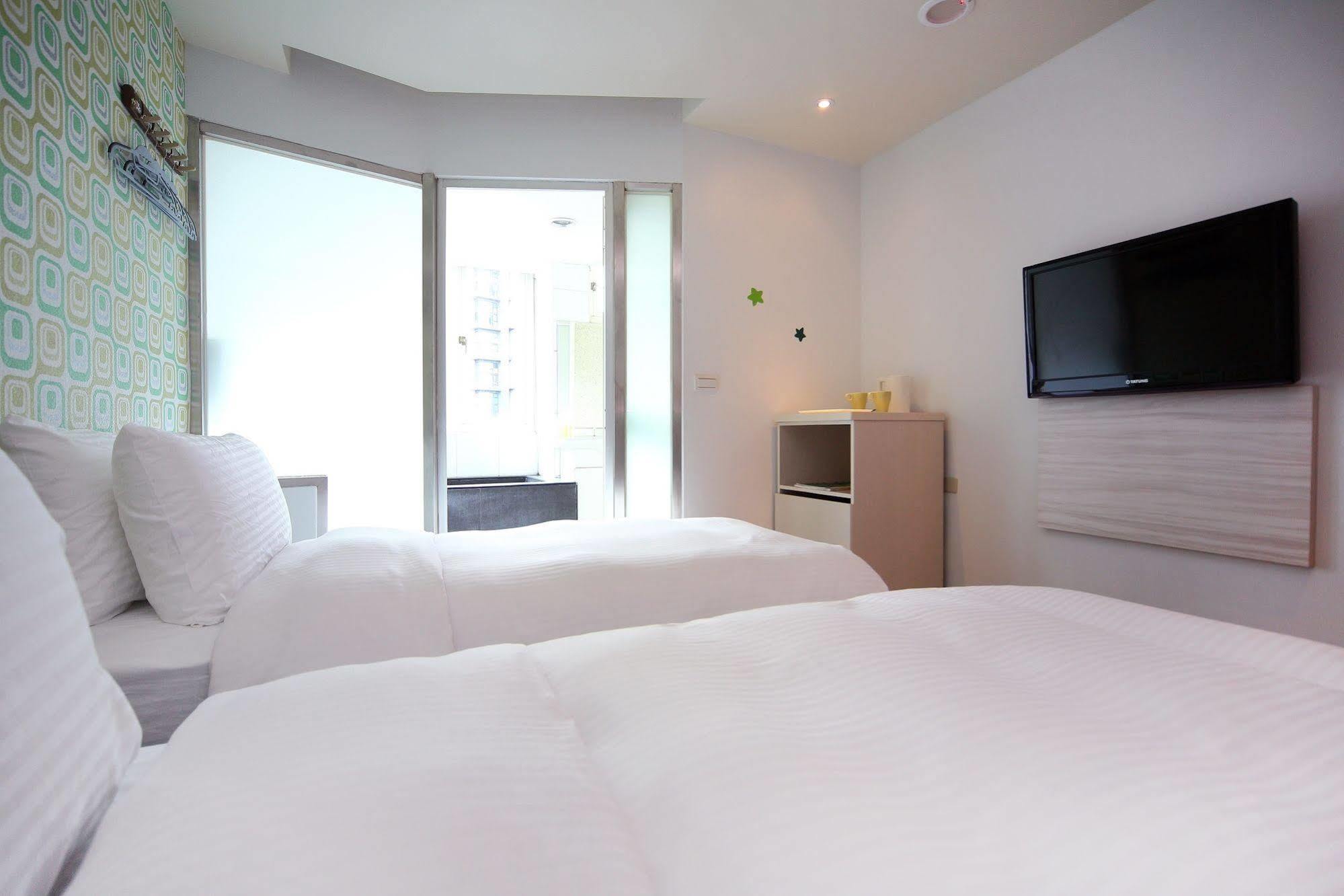 J-Hotel Цзяосі Екстер'єр фото